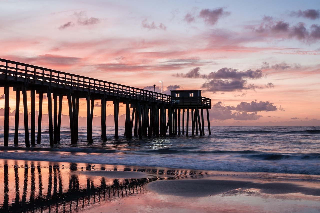 Jersey Shore pier at sunset — vacation rental management